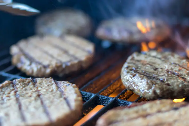 Grilling Burgers closeup sizzling