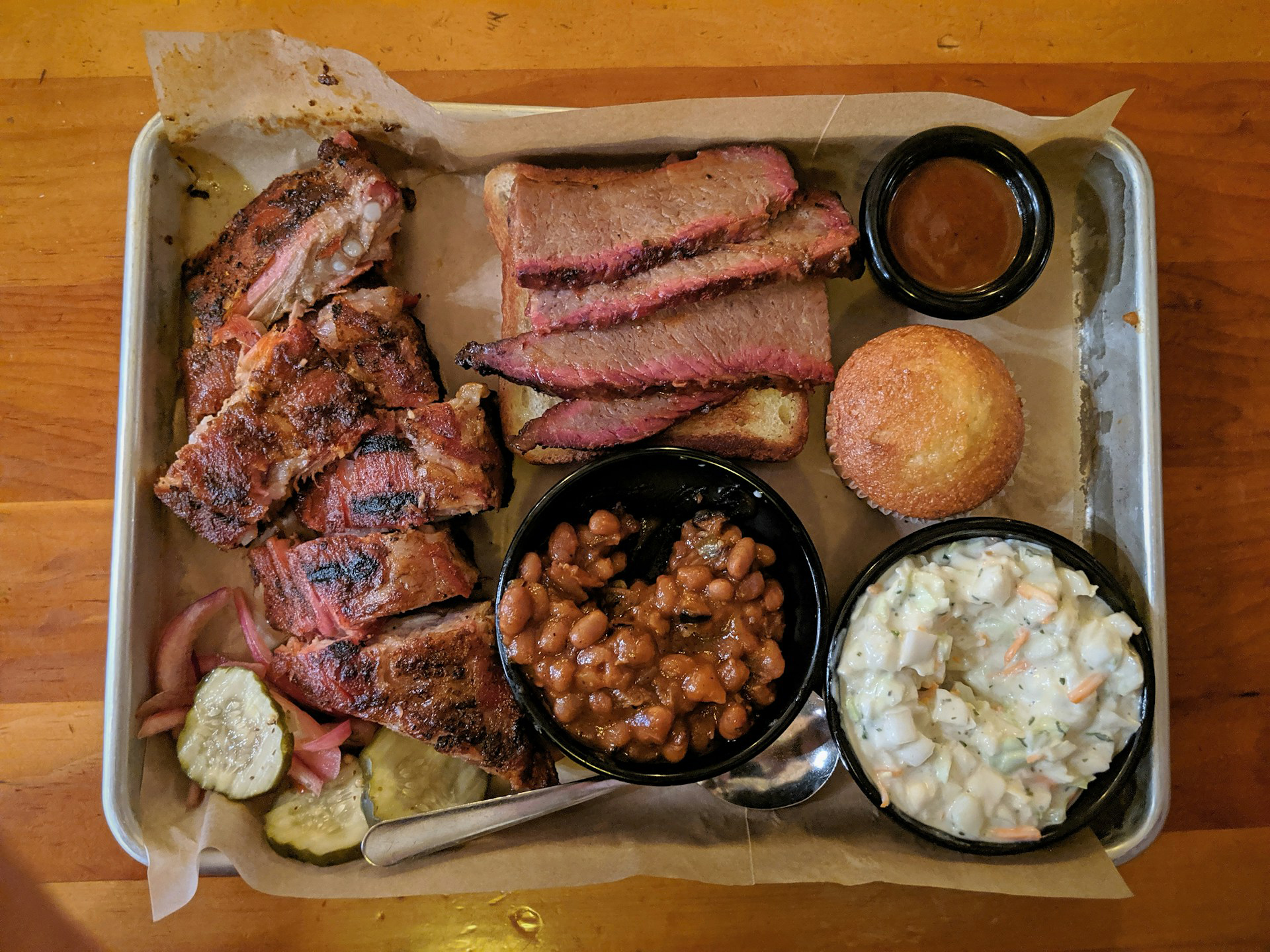 Traditional BBQ tray with baked beans slaw pickles